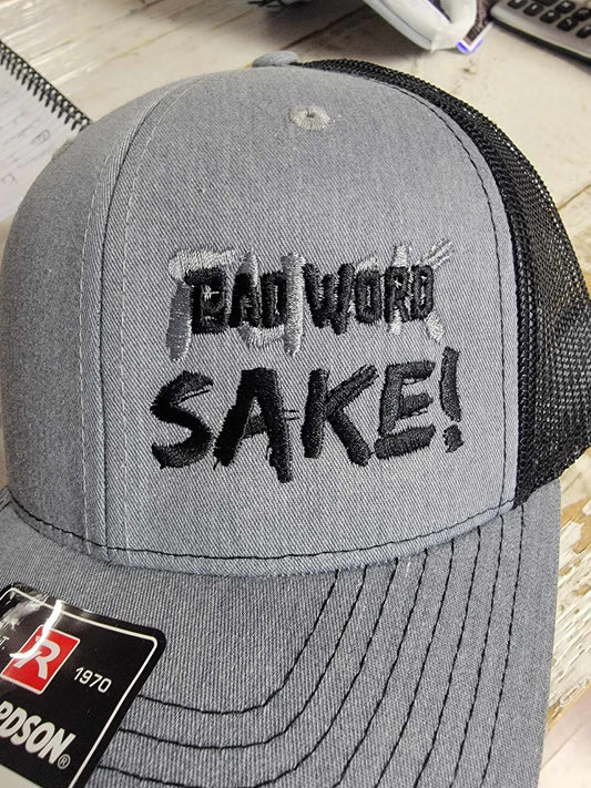 Bad Word Sake Grey Trucker Hat